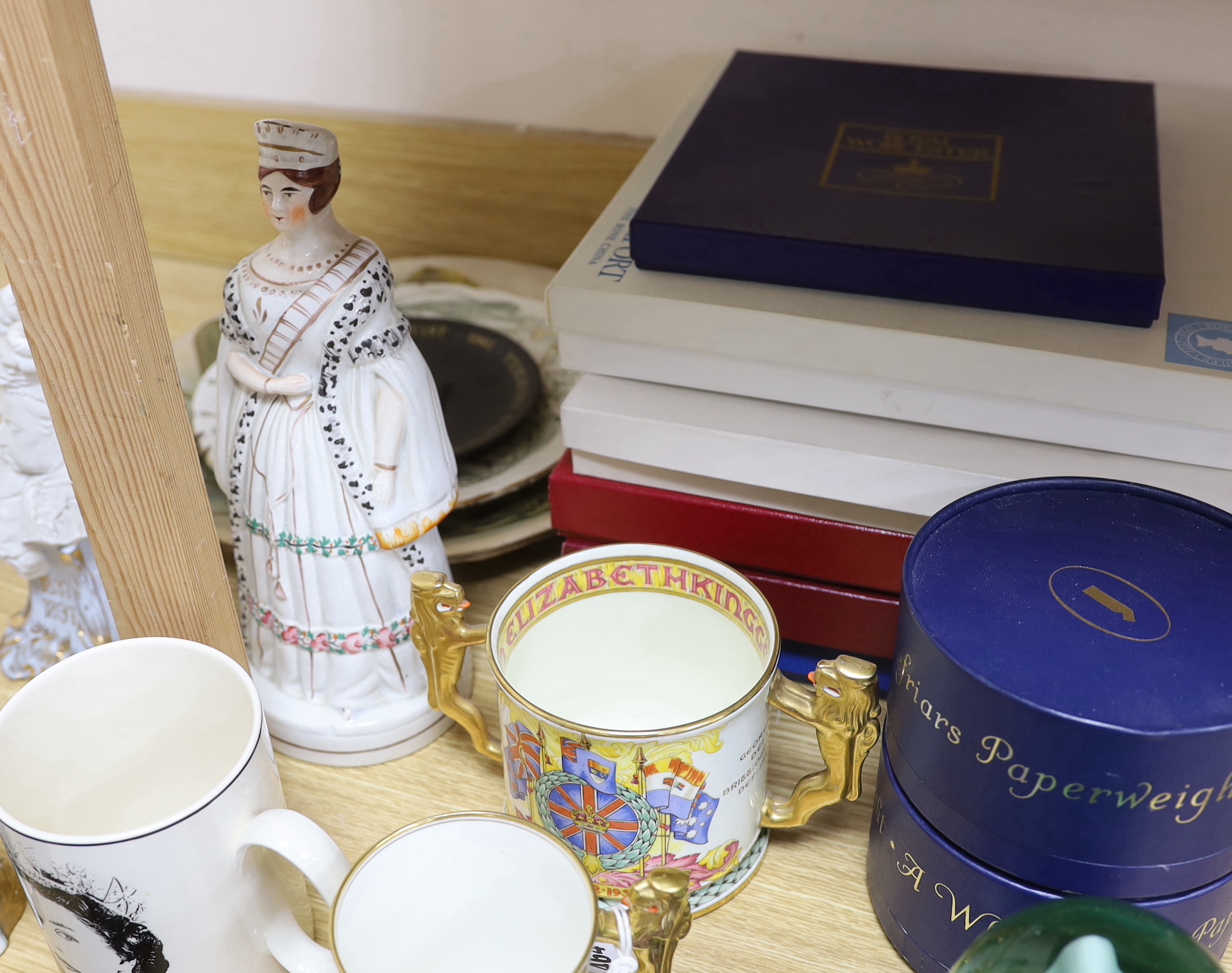 A collection of principally Victorian and later commemorative wares to include a pair of Wedgwood porcelain armorial beasts, glass paperweights etc together with a constabulary truncheon, the largest 39cm in length